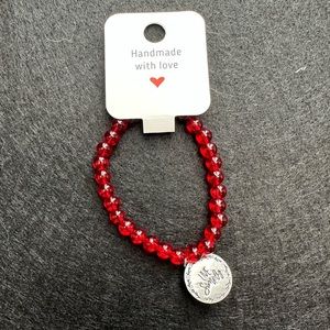 Red Bracelet With Charm
